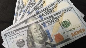 crisp hundred dollar bills